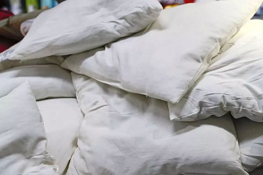 A pile of old feather pillows