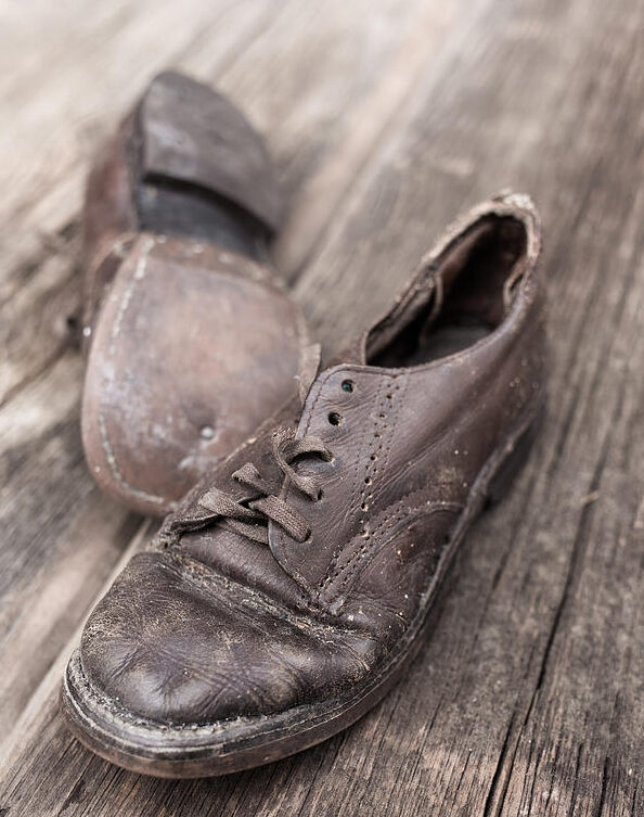 old leather shoes on wooden floor edward fielding e1649182521669